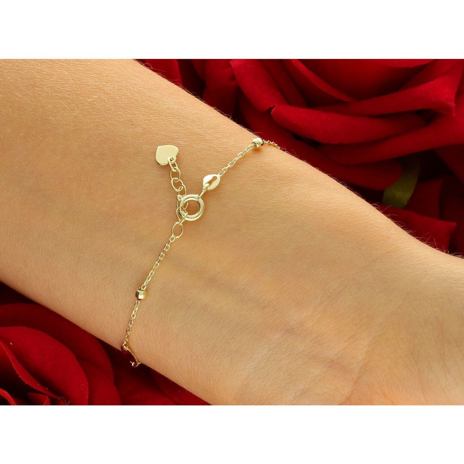 Elegancka złota bransoletka damska próby 585, zdobiona blaszkami podłużnymi i kuleczkami. Długość regulowana 16,5 cm + 1,5 cm, waga 1,48 g, zapięcie na karabińczyk. Idealna do codziennych 1.jpg