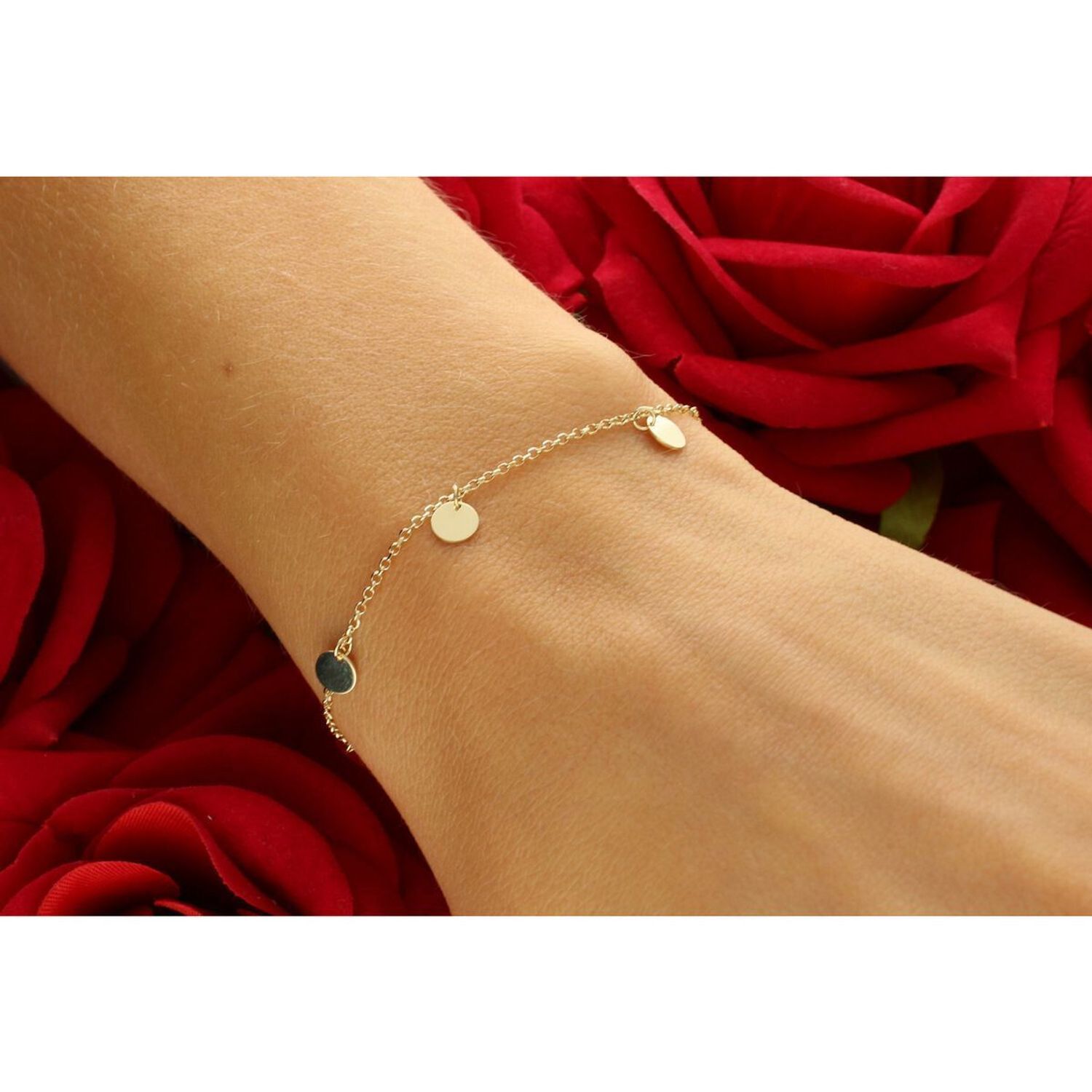 Elegancka złota bransoletka damska próby 585 zdobiona okrągłymi wiszącymi blaszkami. Długość regulowana 17–18 cm, waga 1,38 g, zapięcie na karabińczyk. Idealna do codziennych i 1.jpg