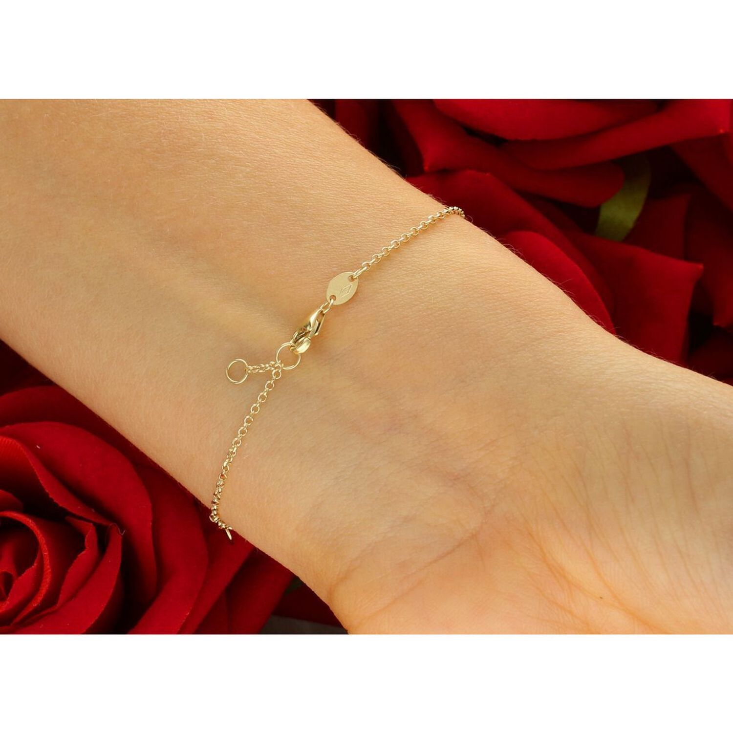 Elegancka złota bransoletka damska próby 585 zdobiona okrągłymi wiszącymi blaszkami. Długość regulowana 17–18 cm, waga 1,38 g, zapięcie na karabińczyk. Idealna do codziennych i 1.jpg