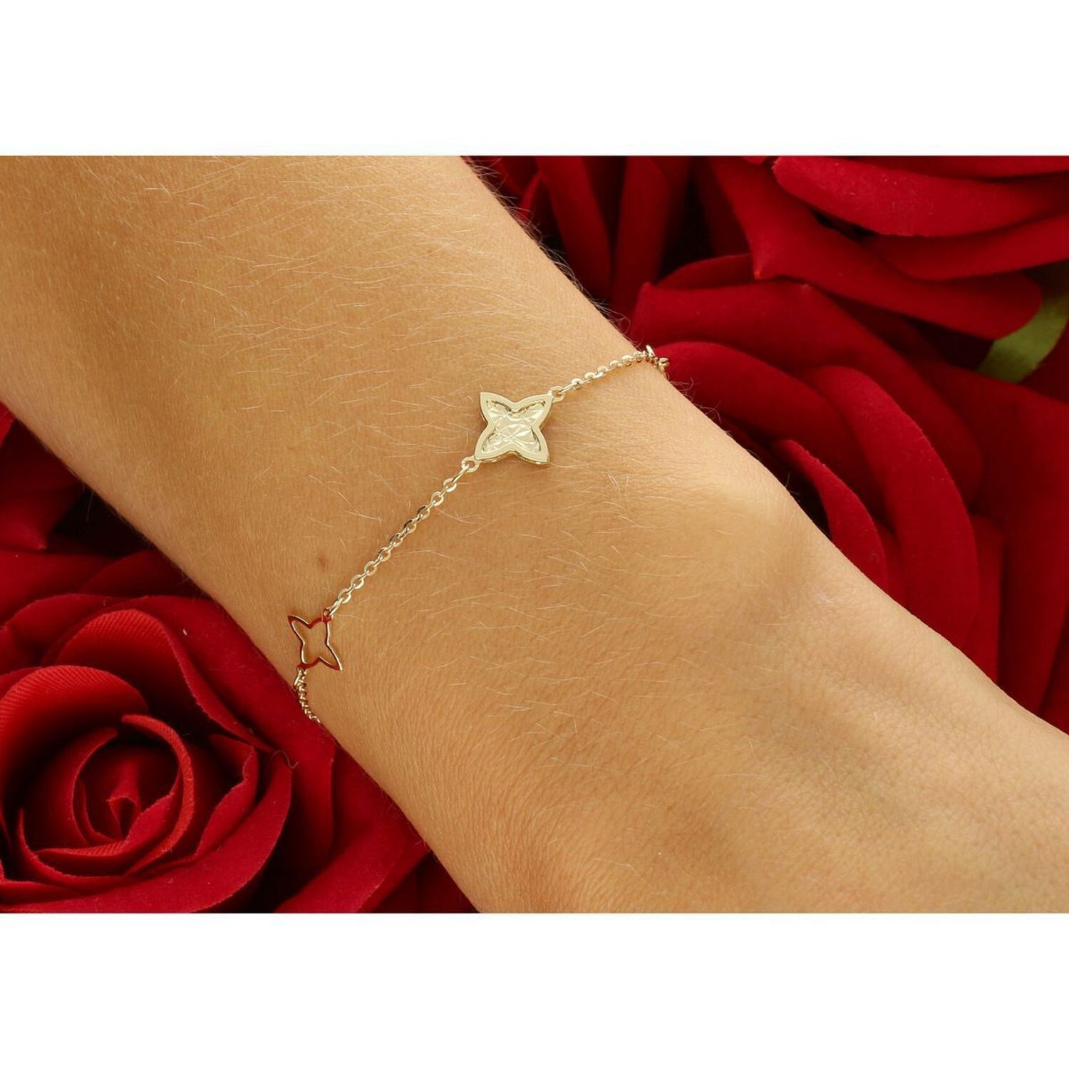 Elegancka złota bransoletka damska próby 585, zdobiona kwiatkami. Długość 18 cm, waga 1,96 g, zapięcie na karabińczyk. Stylowy dodatek idealny na prezent i codzienne noszenie.1.jpg