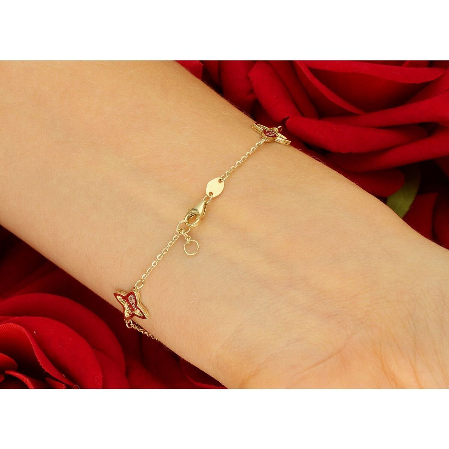 Elegancka złota bransoletka damska próby 585, zdobiona kwiatkami. Długość 18 cm, waga 1,96 g, zapięcie na karabińczyk. Stylowy dodatek idealny na prezent i codzienne noszenie.1.jpg