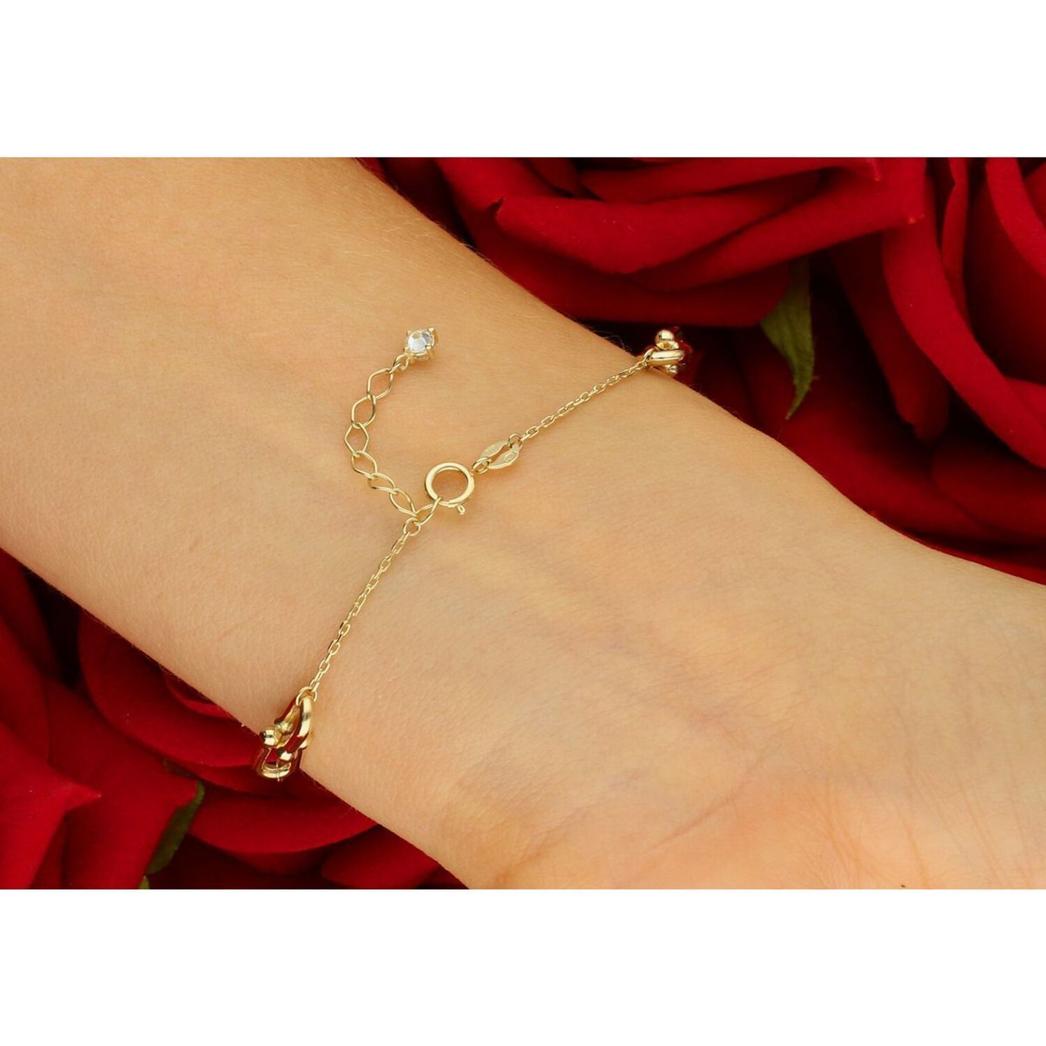 Elegancka złota bransoletka damska próby 585 w stylu ankier, zdobiona elementami ozdobnymi typu Cariterr. Długość 17 cm + 3 cm, waga 2,37 g, zapięcie na karabińczyk. Idealna do codziennych1.jpg