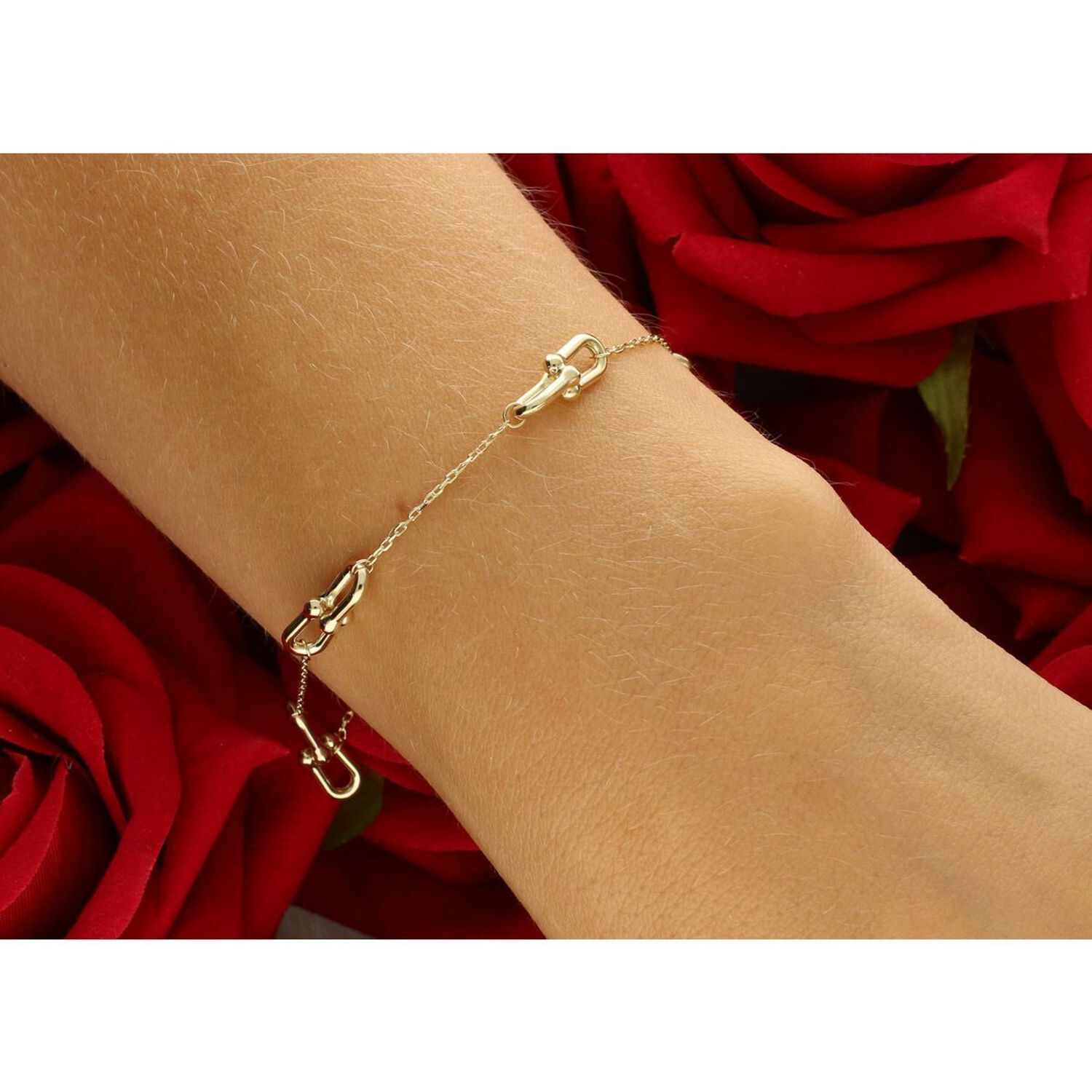 Elegancka złota bransoletka damska próby 585 w stylu ankier, zdobiona elementami ozdobnymi typu Cariterr. Długość 17 cm + 3 cm, waga 2,37 g, zapięcie na karabińczyk. Idealna do codziennych1.jpg