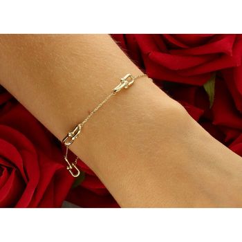 Elegancka złota bransoletka damska próby 585 w stylu ankier, zdobiona elementami ozdobnymi typu Cariterr. Długość 17 cm + 3 cm, waga 2,37 g, zapięcie na karabińczyk. Idealna do codziennych2.jpg