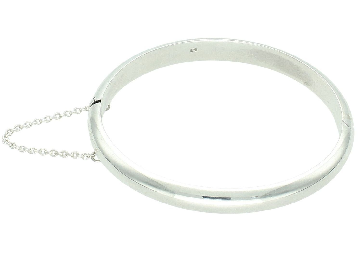 Sztywna srebrna bransoletka 7 mm ze srebra próby 925. Gładka powierzchnia, waga 15 g, zapięcie na zatrzask z łańcuszkiem zabezpieczającym. Klasyczna biżuteria damska.1.jpg