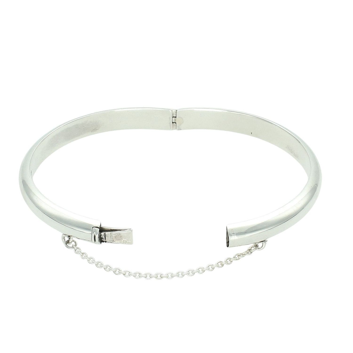 Sztywna srebrna bransoletka 7 mm ze srebra próby 925. Gładka powierzchnia, waga 15 g, zapięcie na zatrzask z łańcuszkiem zabezpieczającym. Klasyczna biżuteria damska.1.jpg