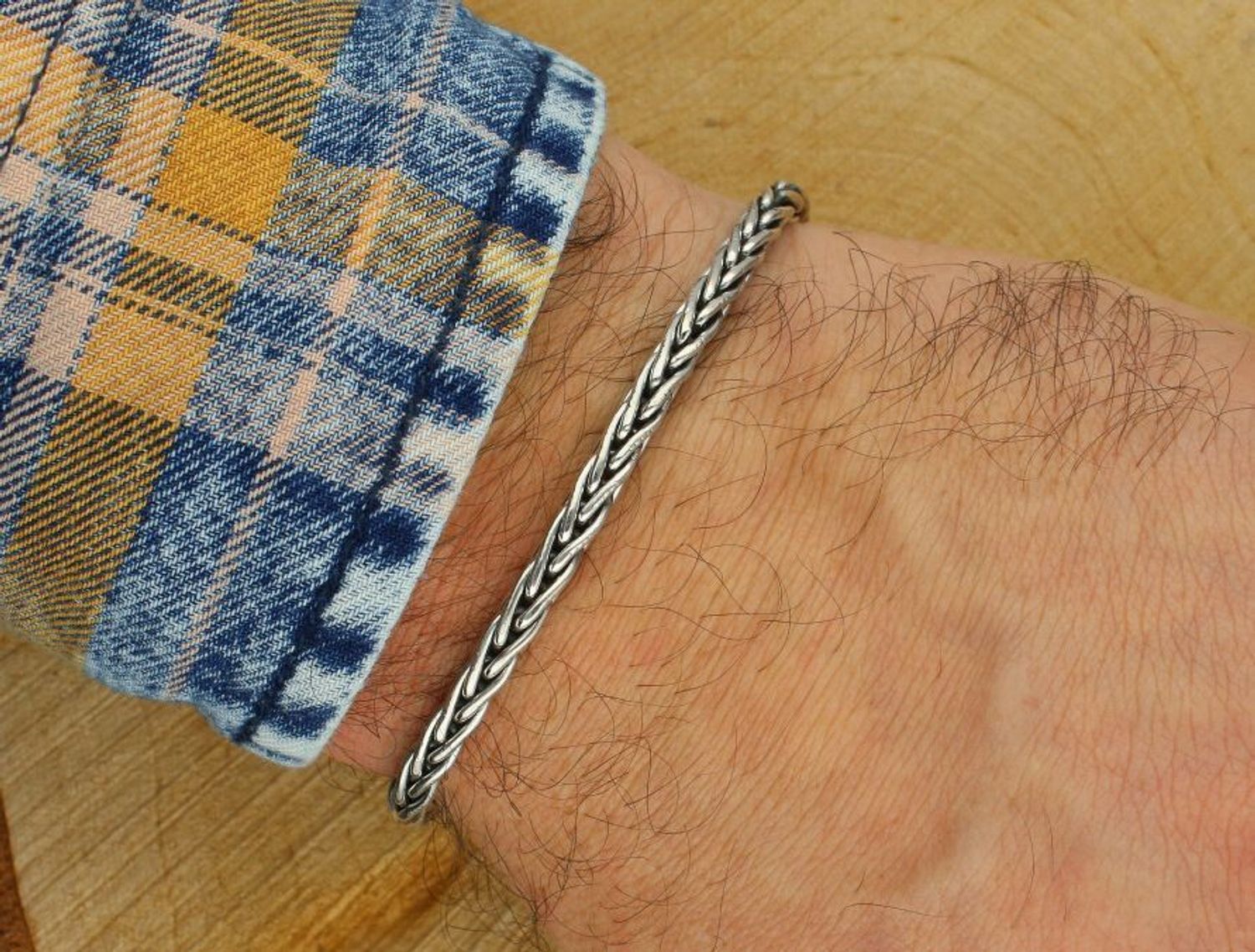 Bransoletka męska ze srebra próby 925 o długości 21 cm. Model DIA-BRA-13921-925 z ozdobnym splotem i zapięciem na haczyk. Elegancka, trwała i stylowa biżuteria dla mężczyzny z klasą – wag1.jpg