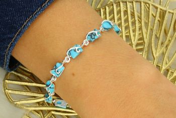 Bransoletka srebrna 925 DIA-BRA-13990-925 z prostokątnymi elementami zdobionymi turkusami. Długość 18+3 cm, szerokość 5 mm, waga 7,90 g. Elegancka i subtelna.2.jpg