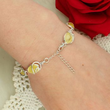 Bransoletka srebrna z żółtym bursztynem bałtyckim zapięcie.jpg