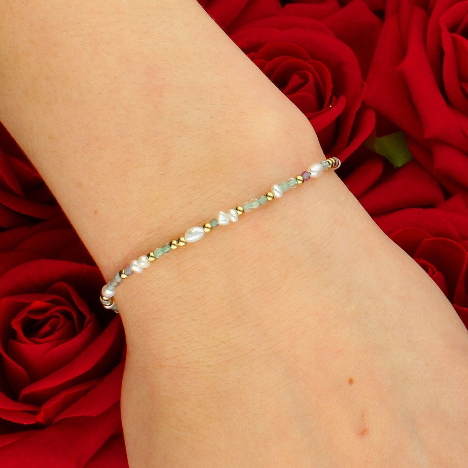 Bransoletka ze stali szlachetnej z perłą hodowlaną i naturalnym fluorytem brans.jpg