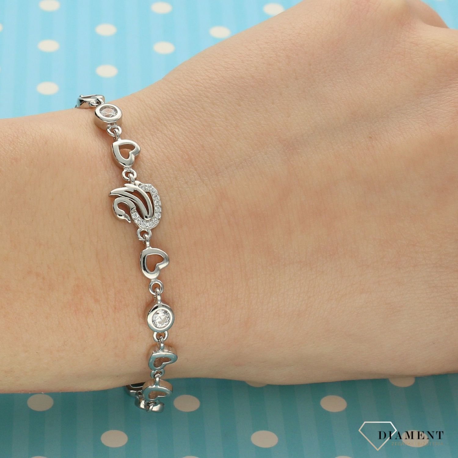 Bransoletka srebrna z łabędziem i serduszkami (1).jpg