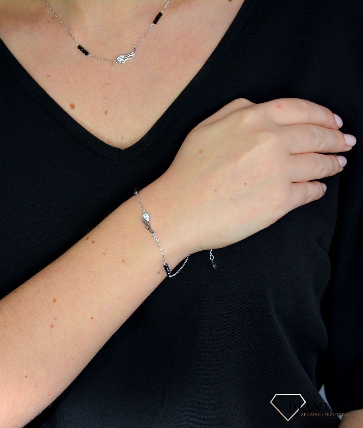 Bransoletka srebrna skrzydełko z cyrkoniami 925 DIA-BRA-2309-925 Srebrna bransoletka została wykonana z wysokiej jakości srebra próby 925. Darmowa dostawa. Idealny prezent.jpg