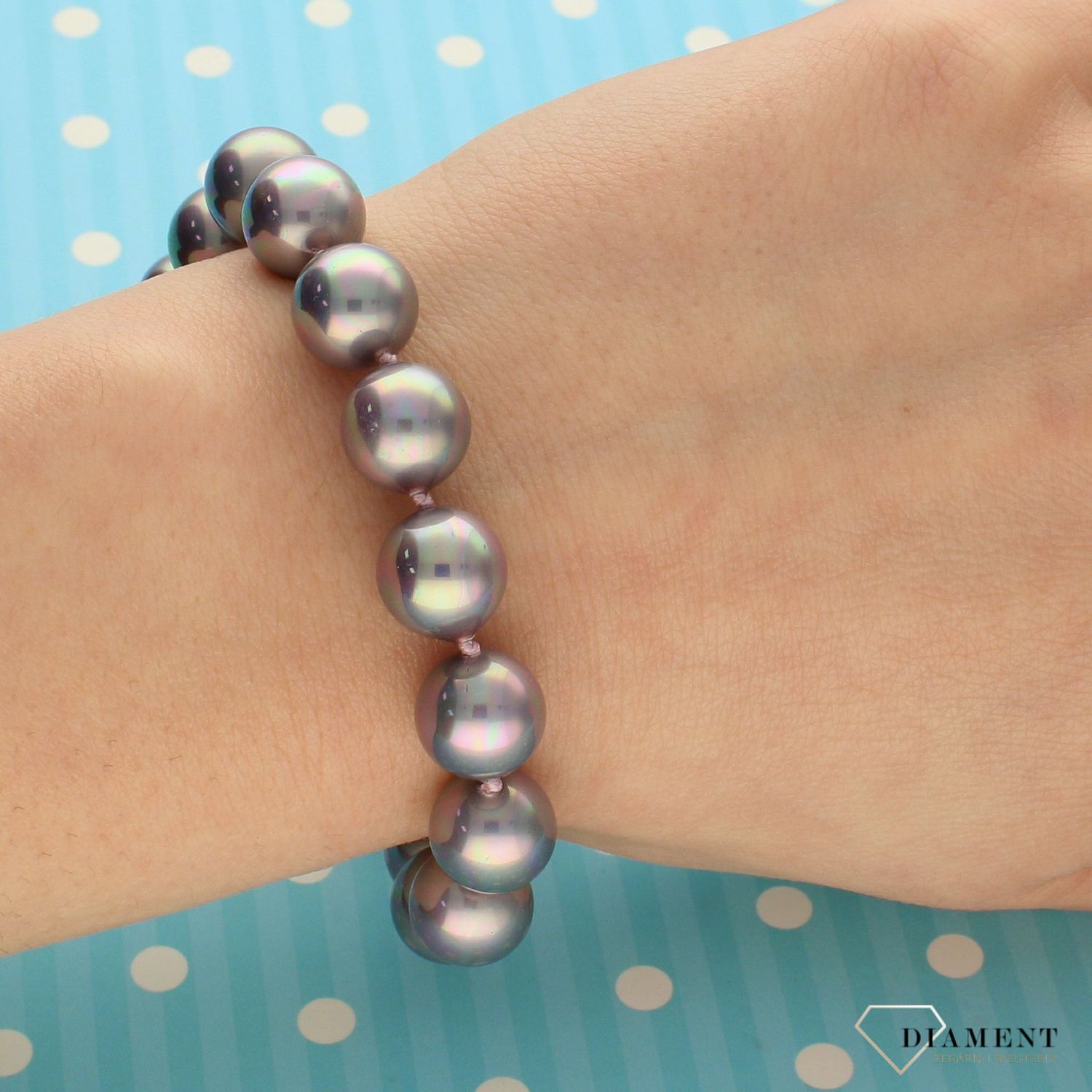 Bransoletka damska z perłopławami w fioletowej kolorystyce DIA-BRA-2351-925.jpg