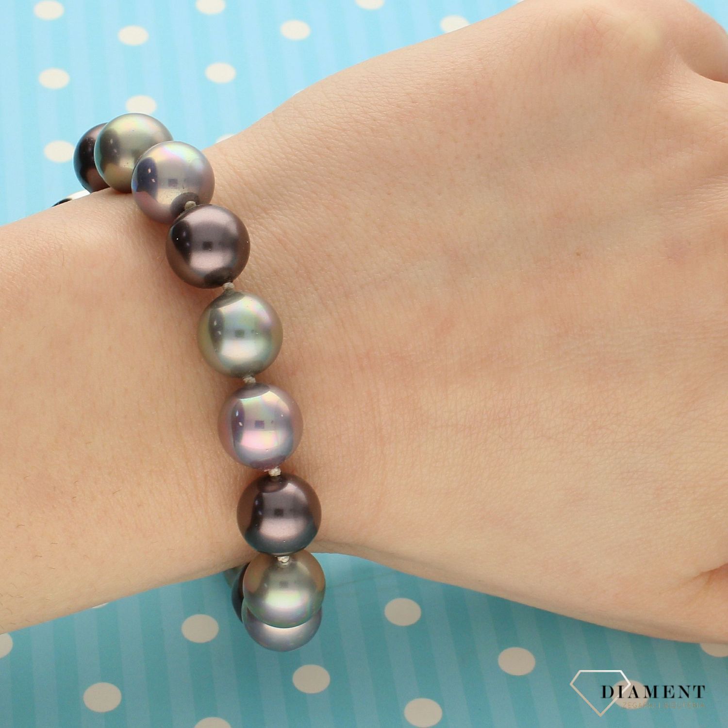 Bransoletka damska z perłopławami w kolorystyce różowo fioletowej DIA-BRA-2352-925.jpg