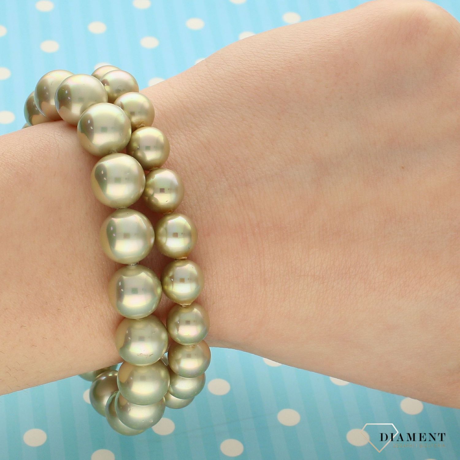 Bransoletka damska z perłopławami w kolorze złotym DIA-BRA-2361-INNE.jpg