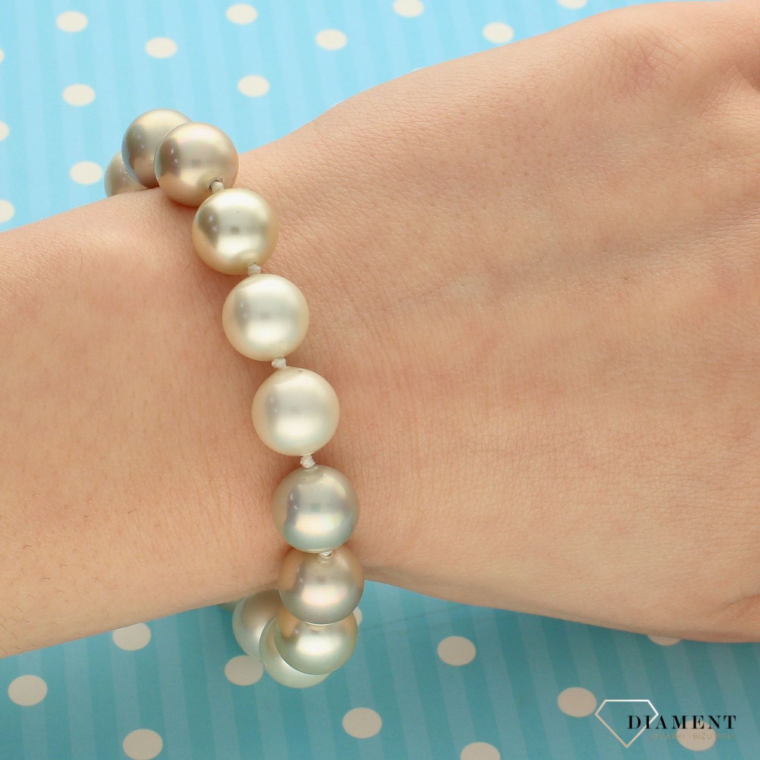 Bransoletka damska z perłopławami z odcieniami bieli DIA-BRA-2366-925.jpg