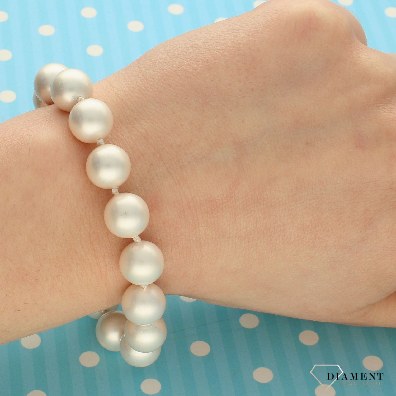 Bransoletka damska z perłopławami z kolorze białym DIA-BRA-2368-925.jpg