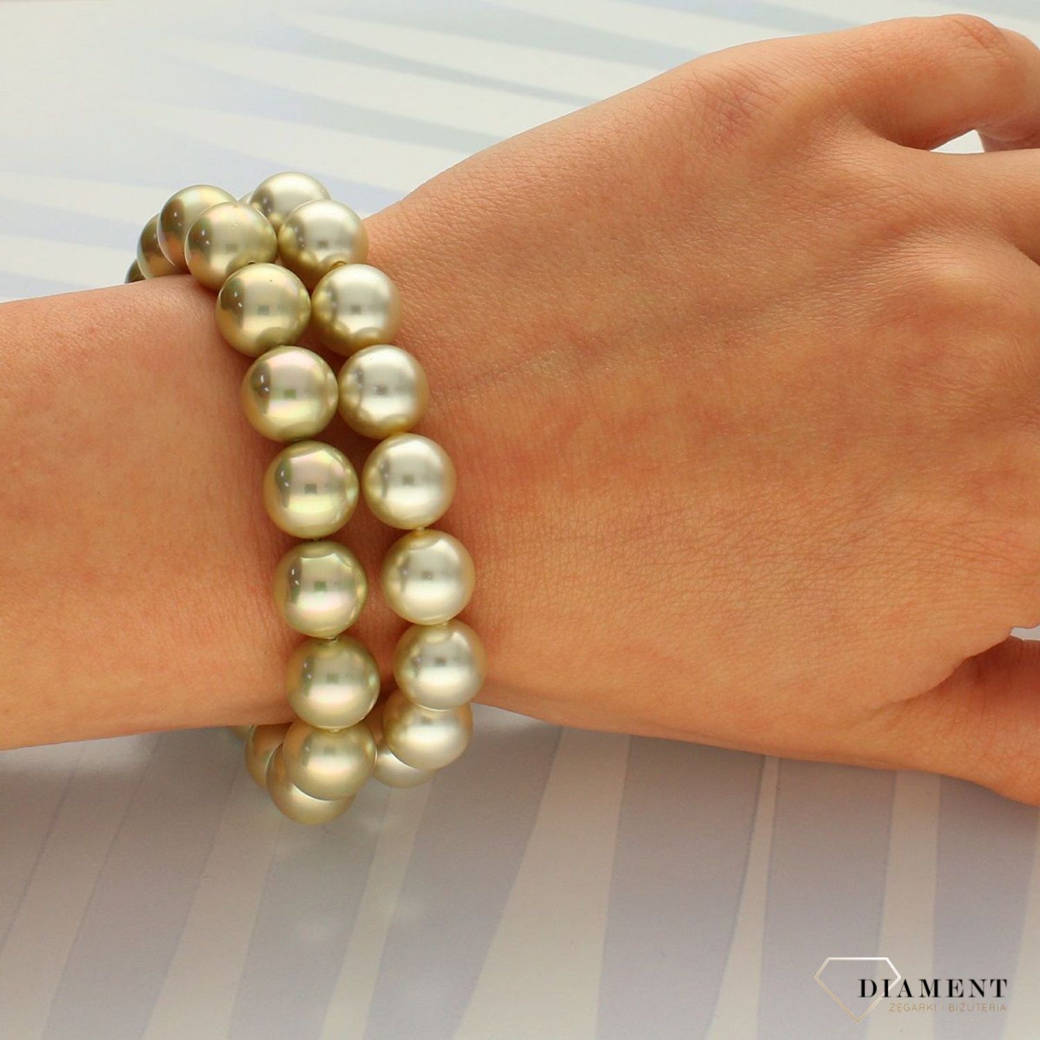Bransoletka z perłami 'Złocisty blask' DIA-BRA-2389-INNE. Bransoletka z perłami w kolorze złotym. Bransoletka z perłami 'Złocisty blask' (1).jpg