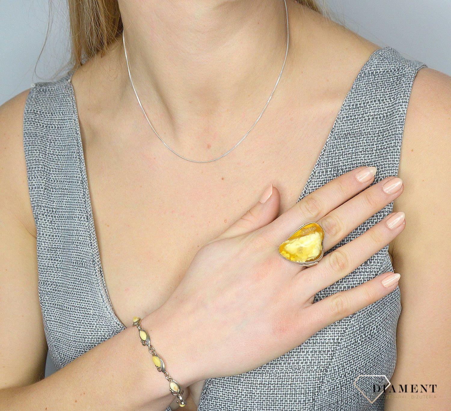 Bransoletka srebrna z jasnymi bursztynami DIA-BRA-2474-bursztyn Diament.jpg