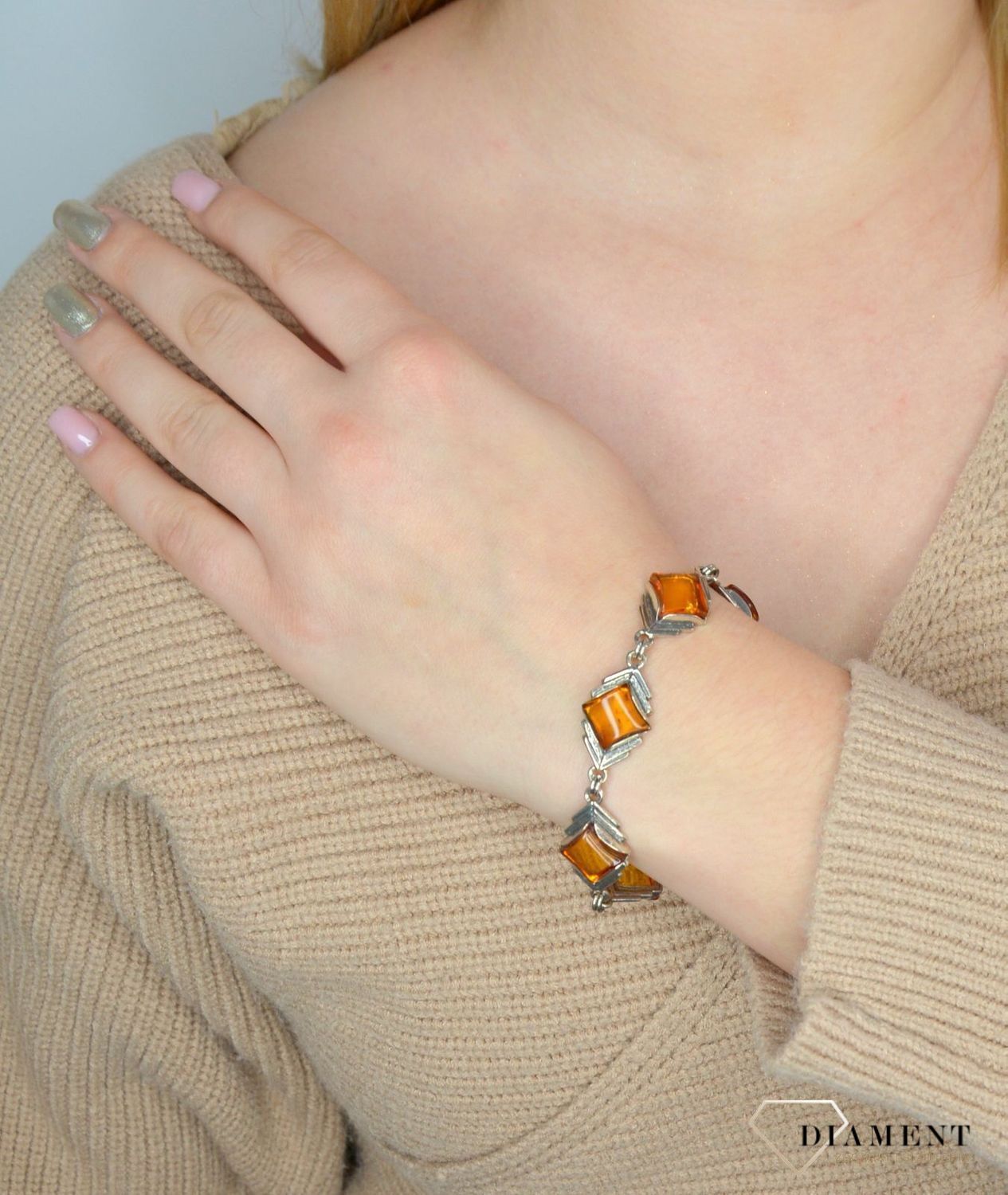 Bransoletka srebrna z bursztynem w kolorze jasnego brązu DIA-BRA-2478-bursztyn.jpg