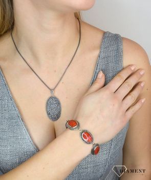 Bransoletka z markazytami i czerwonymi kamieniami DIA-BRA-2506-925  to piękna bransoletka wykonana w wysokiej próbie srebra 925. Bransoletka z markazytami to propozycja od sklepu jubilerskiego Diame (3).JPG