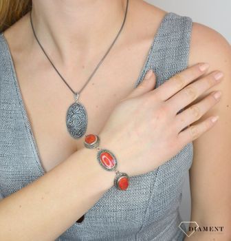 Bransoletka z markazytami i czerwonymi kamieniami DIA-BRA-2506-925  to piękna bransoletka wykonana w wysokiej próbie srebra 925. Bransoletka z markazytami to propozycja od sklepu jubilerskiego Diame (4).JPG
