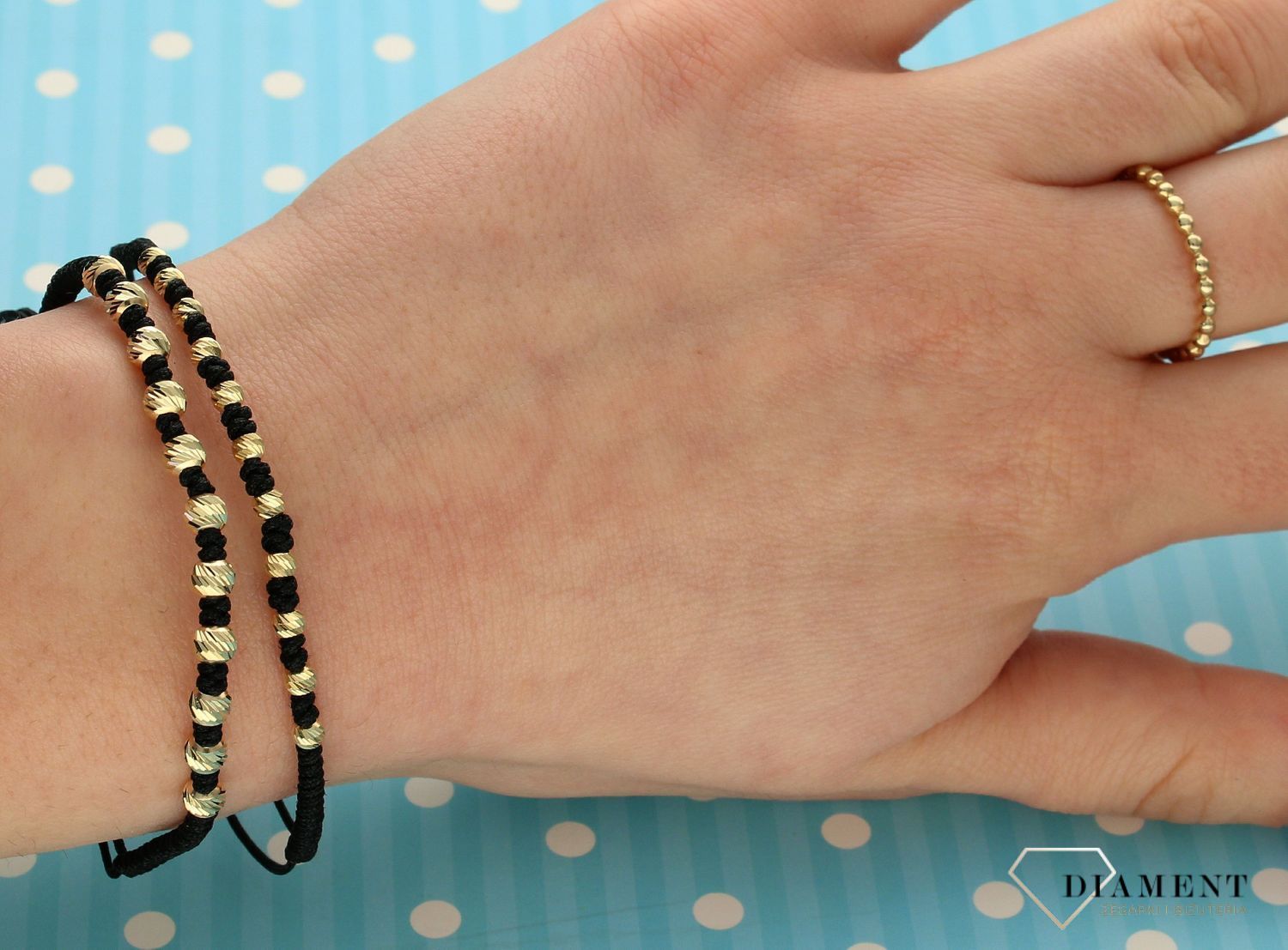 Bransoletka na sznureczku złote koraliki DIA-BRA-2694-585.jpg