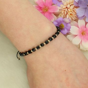 Bansoletka na sznurku złoto 585 kuleczki i kwadratowe koraliki czarny sznurek Au.jpg