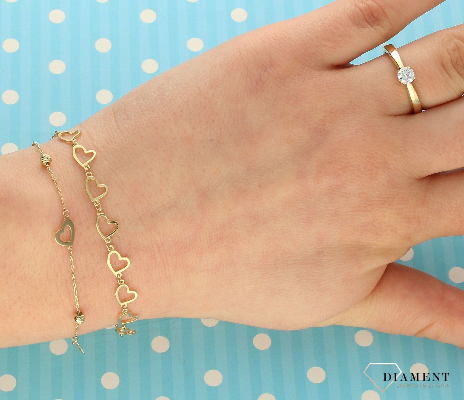 Złota bransoletka celebrytka 585 rząd serc DIA-BRA-2757-585.jpg
