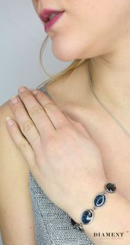 Bransoletka srebrna oksydowana 'Niebieskie kamienie' DIA-BRA-2790-925. Srebrna bransoletka damska z masą jubilerską w kolorze niebieskim. W symbolicznej biżuterii dominuje minimalistyczny styl i ponadczasowa forma (4).JPG