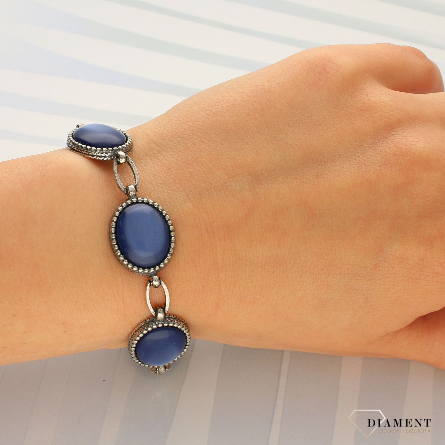 Srebrna bransoletka w niebieskim kolorze DIA-BRA-2973-925 (1).jpg