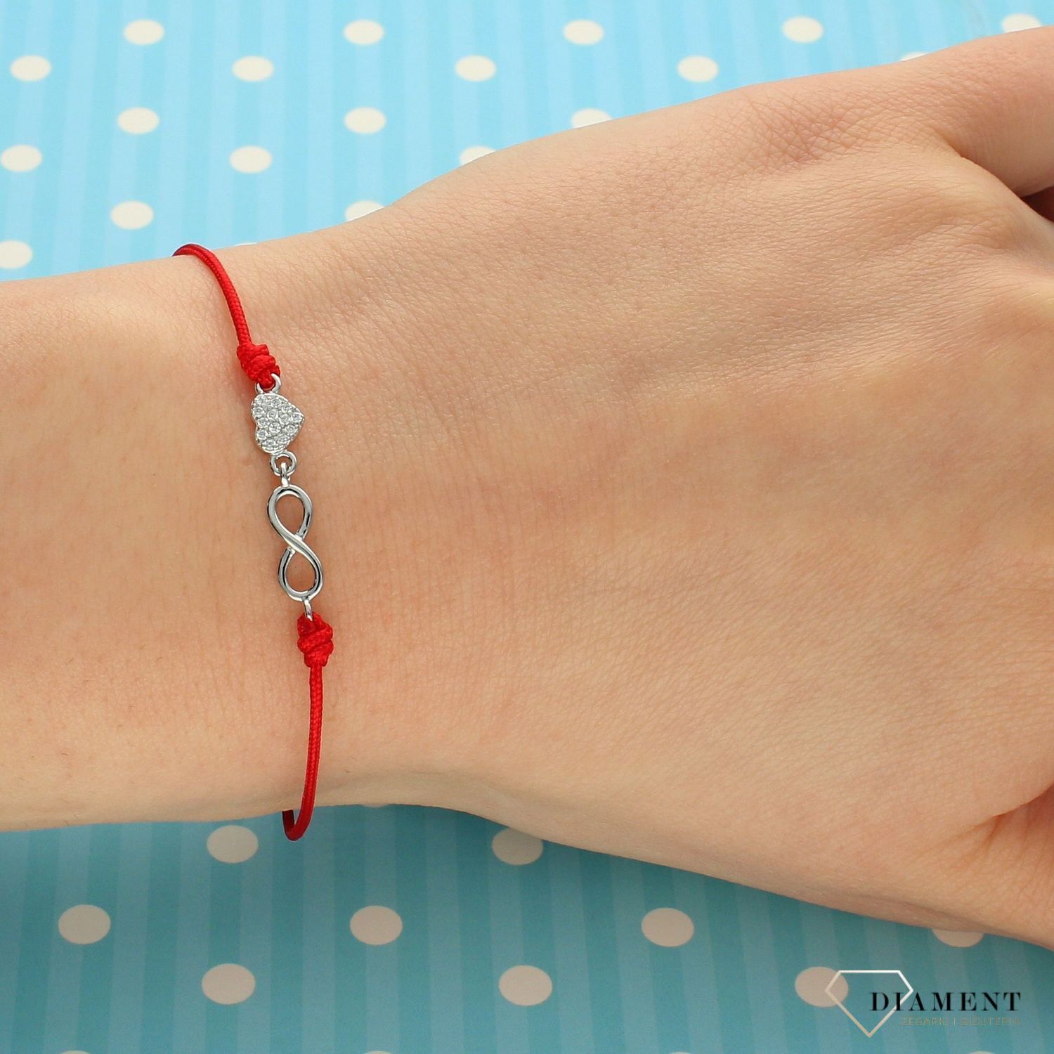 Srebrna bransoletka na czerwonym sznurku serce i nieskończoność DIA-BRA-3594-925.jpg