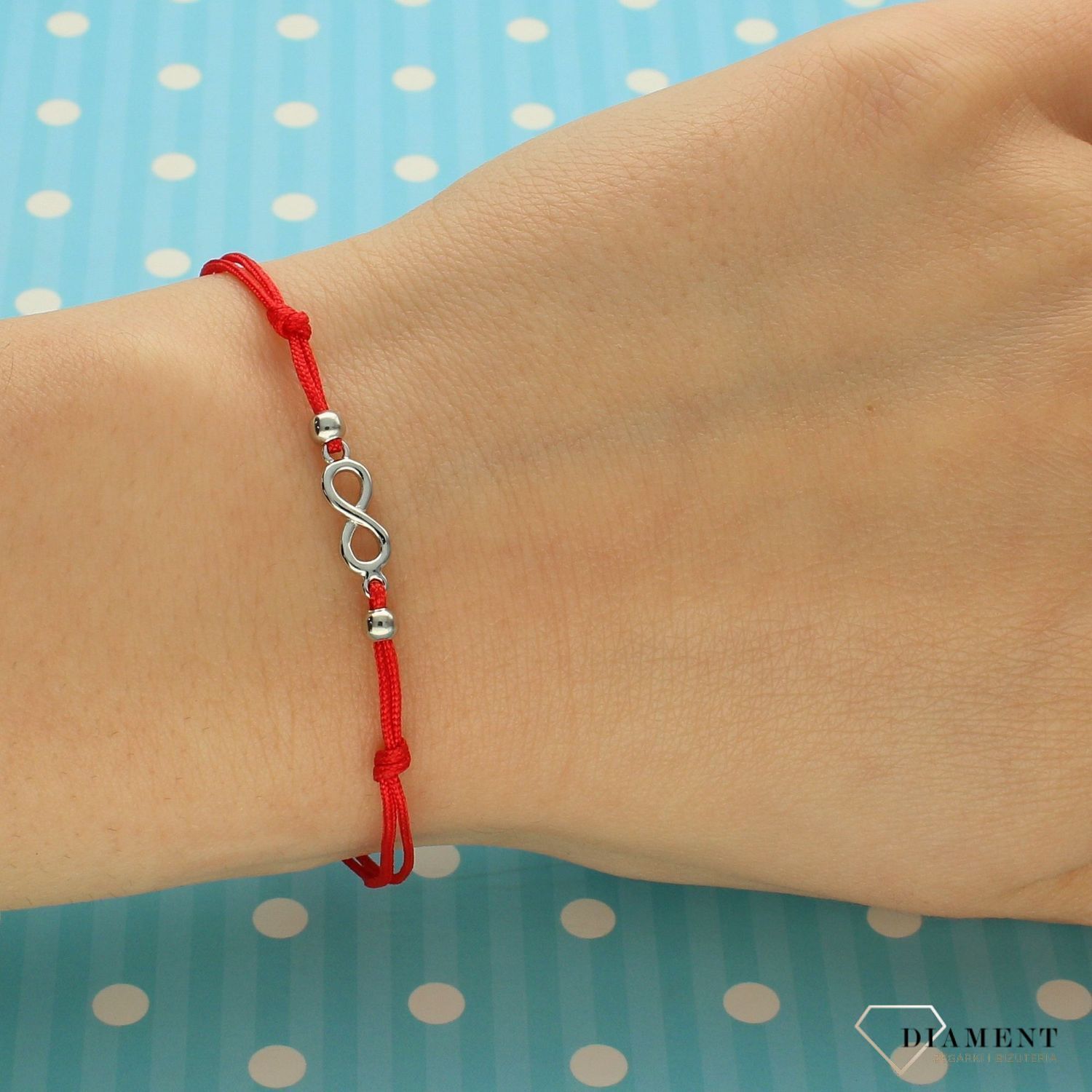 Srebrna bransoletka na czerwonym sznurku znak nieskończoności DIA-BRA-3595-925.jpg
