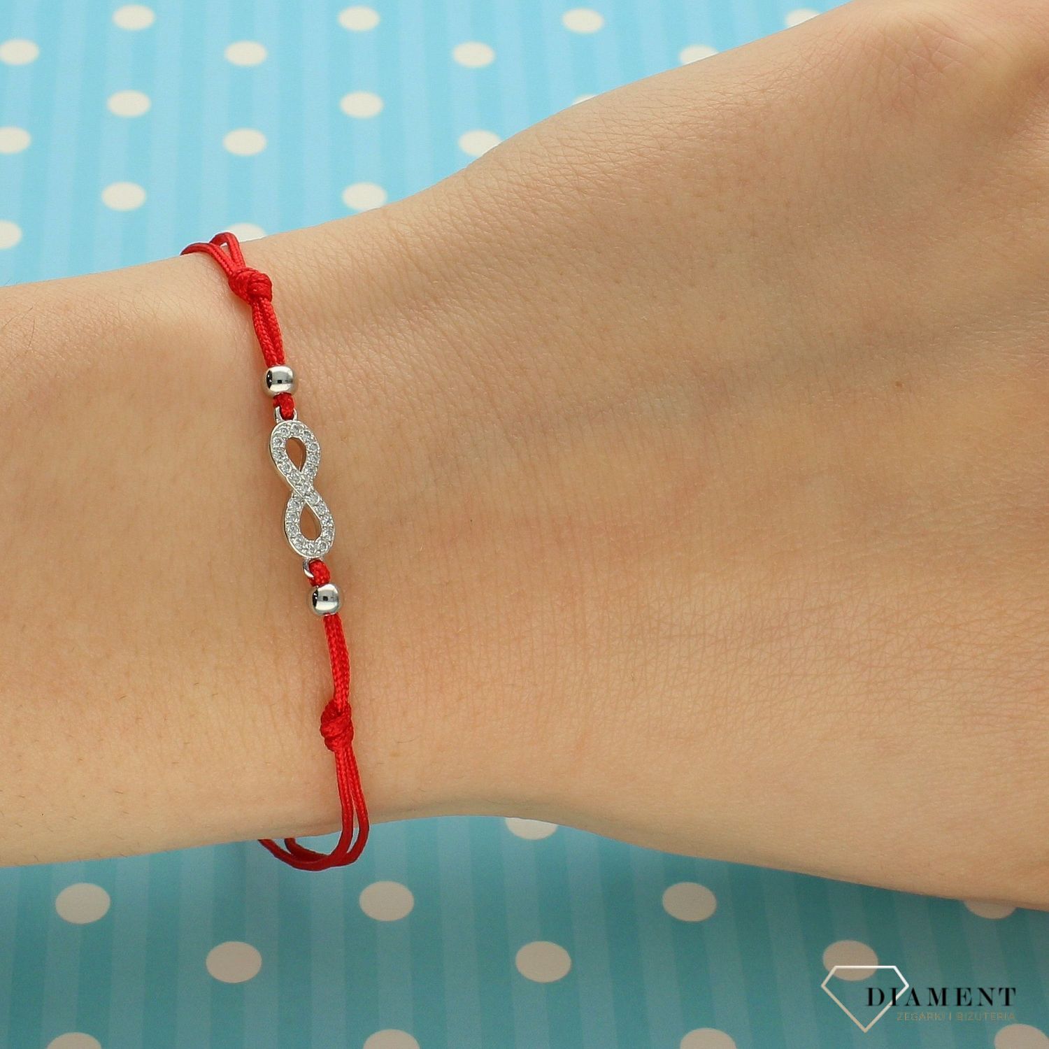 Srebrna bransoletka na czerwonym sznurku nieskończoność z cyrkonią DIA-BRA-3596-925.jpg