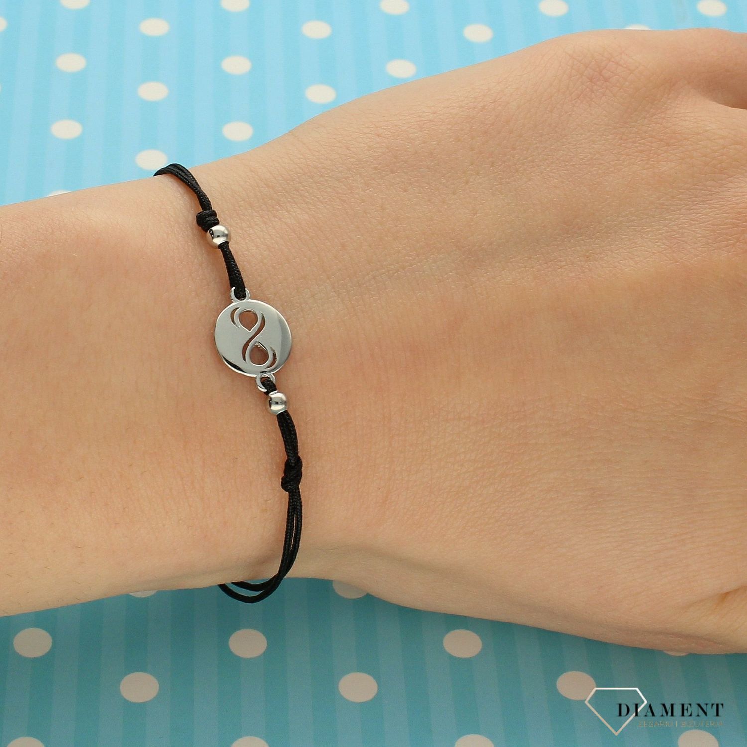 Srebrna bransoletka na czarnym sznurku ze znakiem nieskończoności DIA-BRA-3600-925.jpg