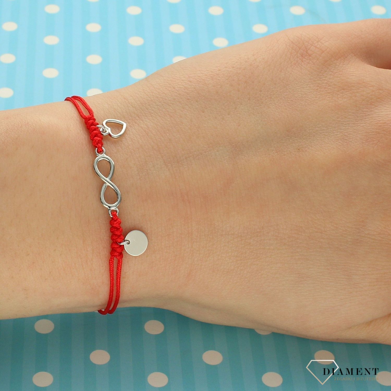 Srebrna bransoletka na czerwonym sznurku kółko, serce, nieskończoność DIA-BRA-3603-925.jpg
