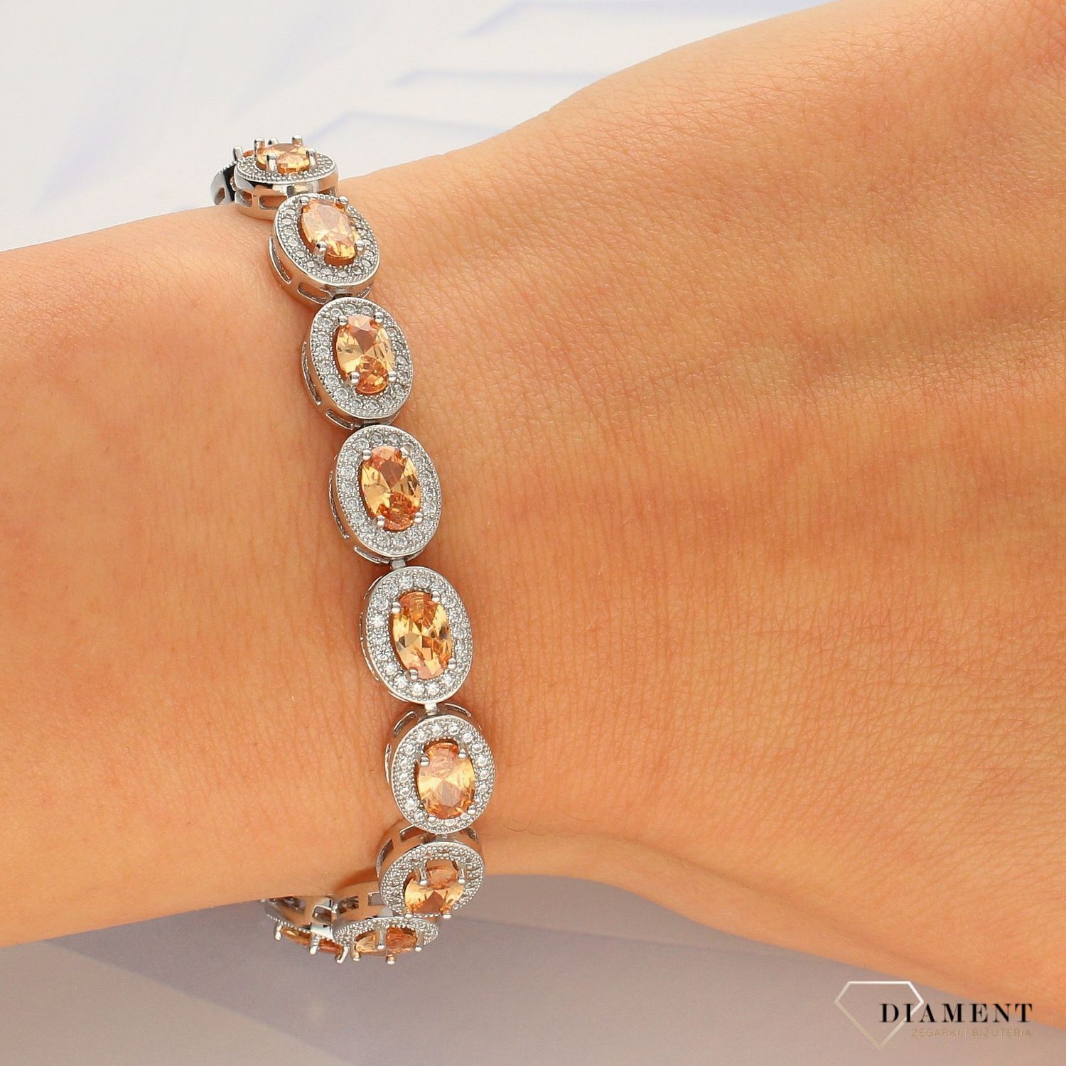 Elegancka bransoletka z brązowymi cyrkoniami DIA-BRA-3838-925 (1).jpg