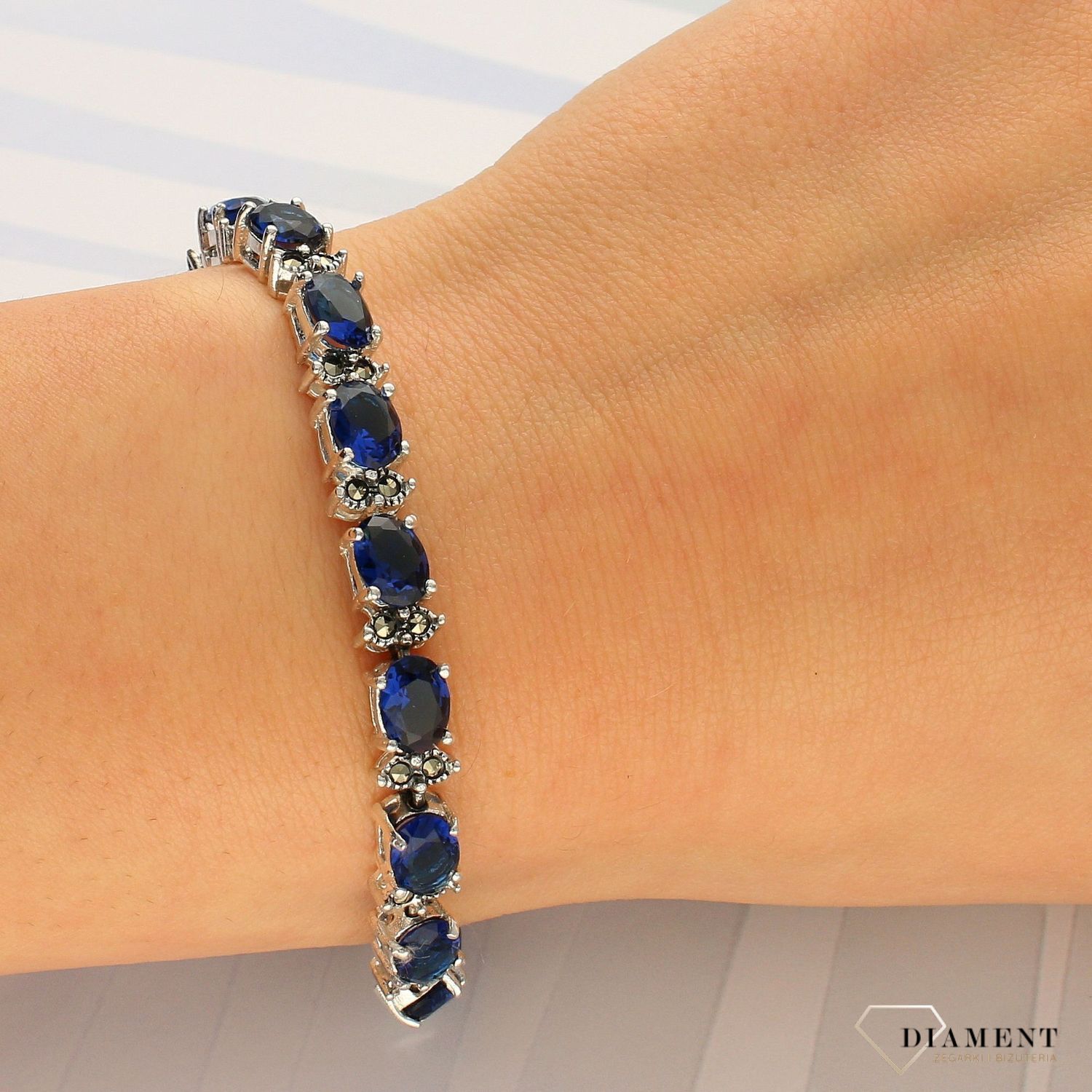 Srebrna bransoletka z niebieską cyrkonią i markasytami DIA-BRA-3931-925 (1).jpg