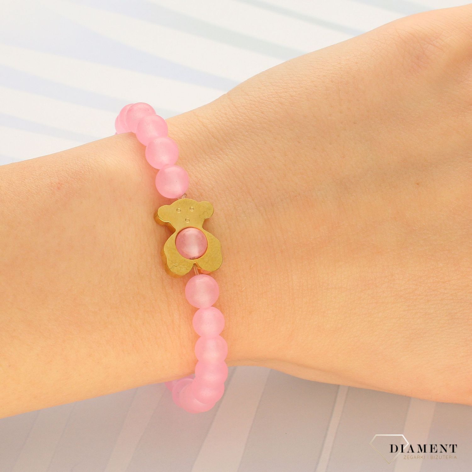 Bransoletka 'TUOS' z różowymi koralikami i złotym misiem DIA-BRA-4102-STAL (1).jpg