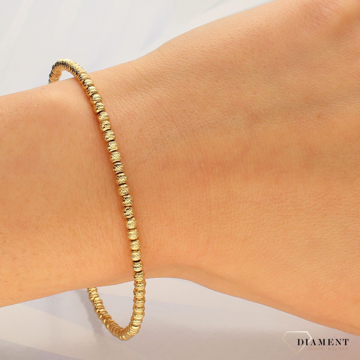 Złota bransoletka 585 sztywna z grawerowanymi kuleczkami DIA-BRA-4156-585 (1).jpg