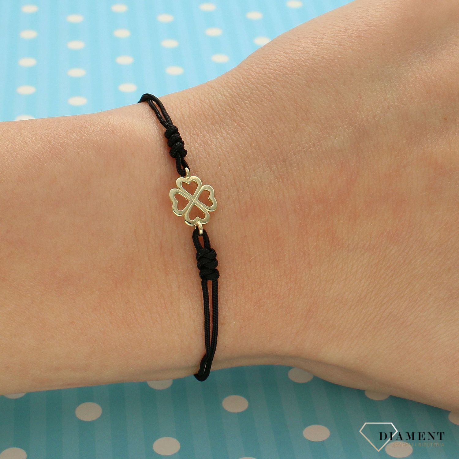 Złota bransoletka na czarnym sznurku z koniczynką DIA-BRA-4185-585 (1).jpg