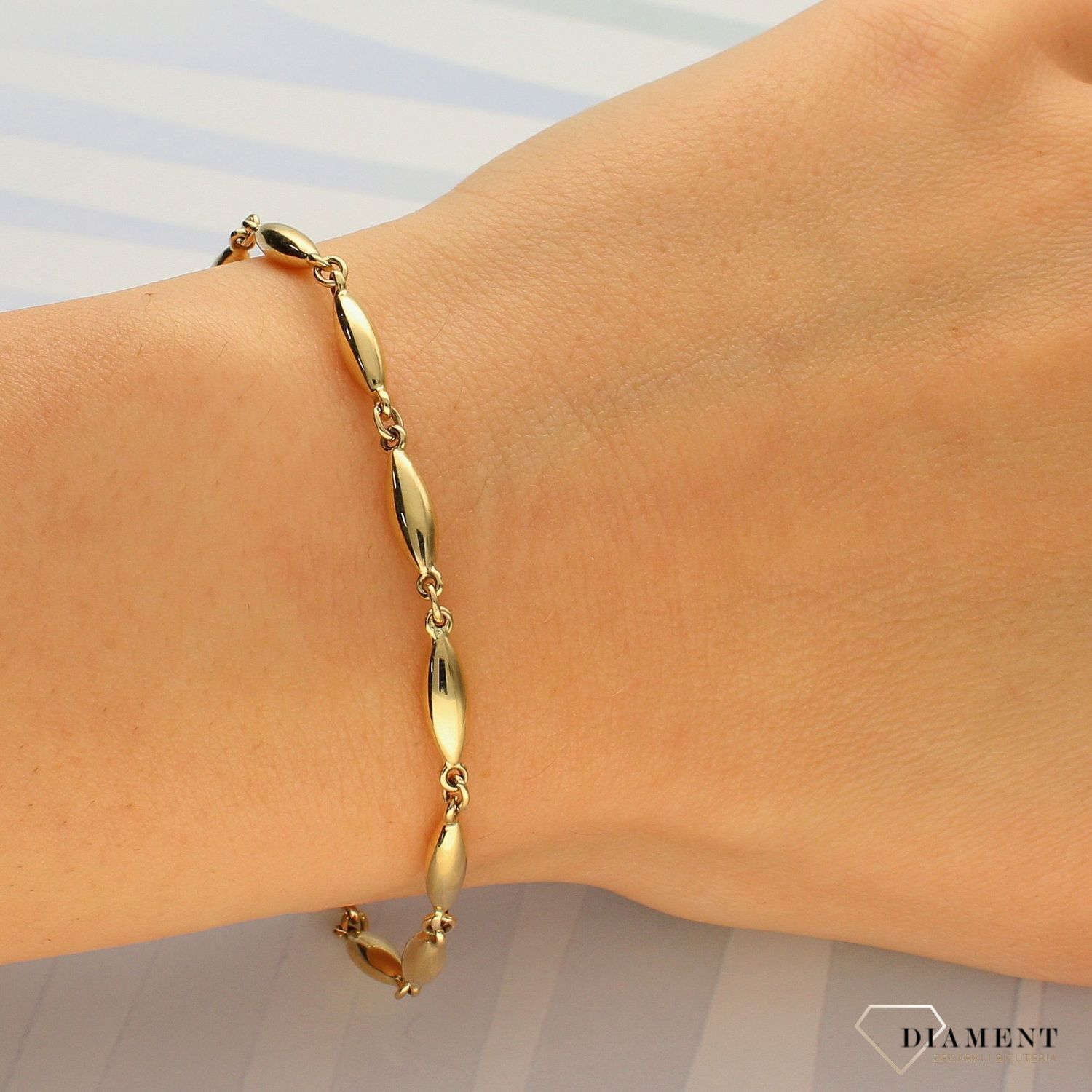 Złota bransoletka równe elementy o nowoczesnym wyglądzie DIA-BRA-4255-585. Ponadczasowa, klasyczna biżuteria (1).jpg