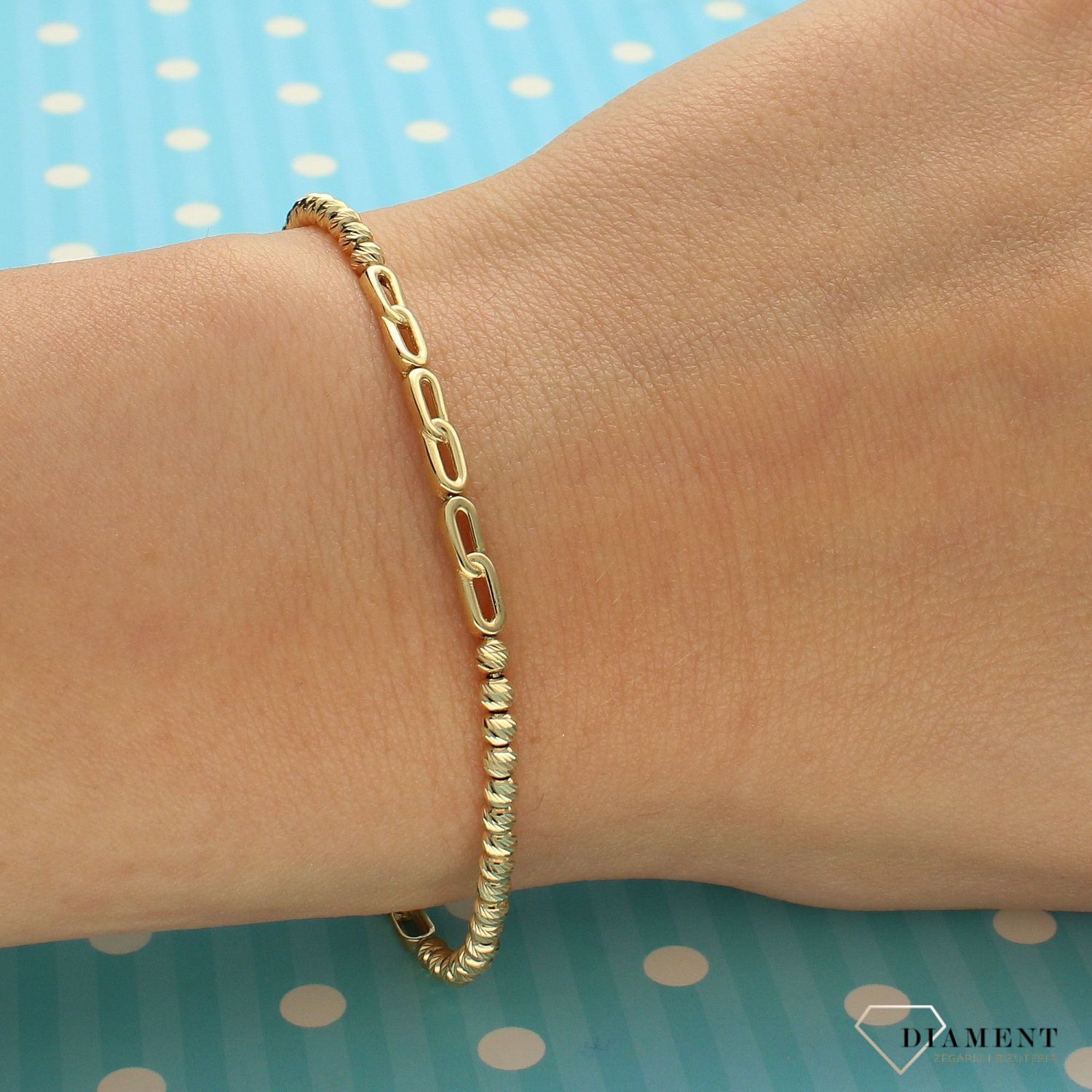 Złota bransoletka grawerowane złote kuleczki z klasycznym łańcuszkiem DIA-BRA-4257-585 (1).jpg