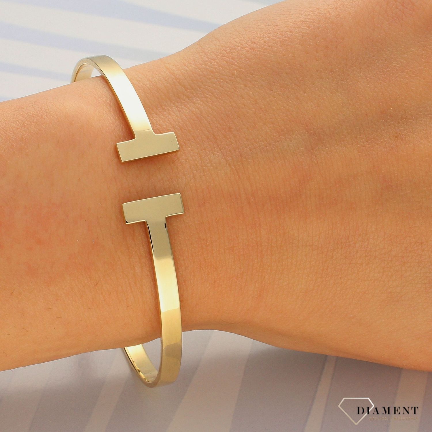 Złota bransoletka sztywna z gładkimi blaszkami DIA-BRA-4287-585 (1).jpg