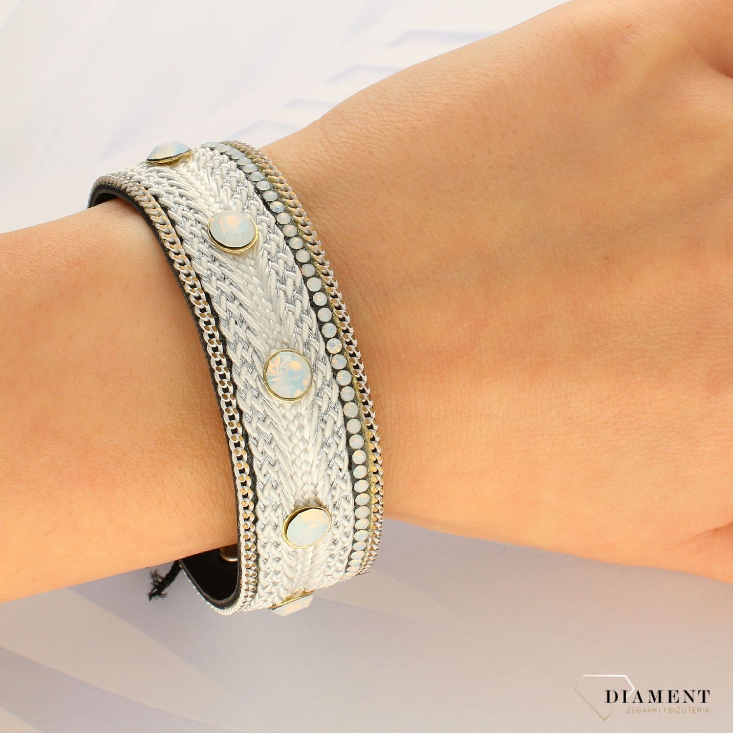 Szeroka damska bransoletka z ozdobnymi cyrkoniami w białym odcieniu DIA-BRA-4332-INNE (1).jpg