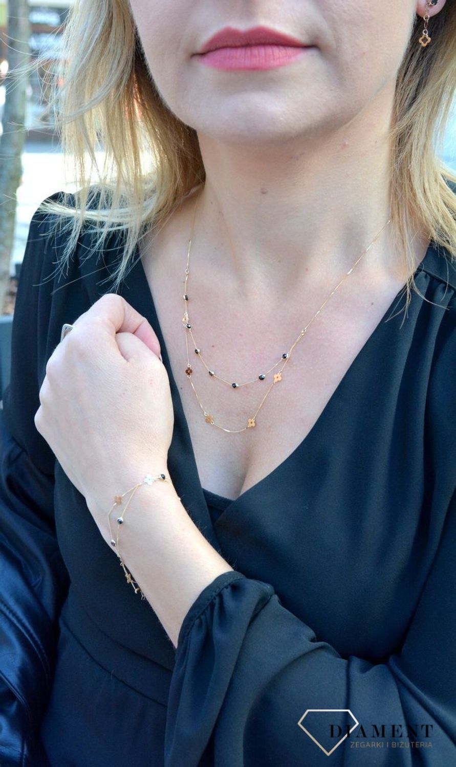 Złota bransoletka celebrytka podwójny łańcuszek z kwiatkami i czarną cyrkonią DIA-BRA-4455-585.jpg