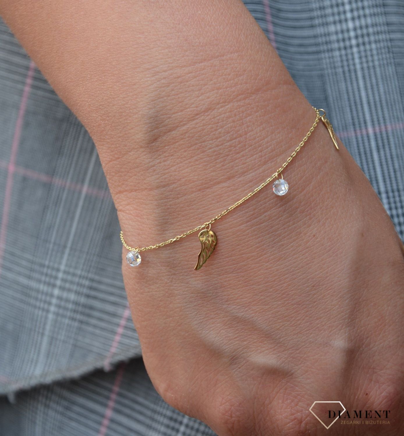 Złota bransoletka celebrytka 375 skrzydełka z białym kryształem DIA-BRA-47K40-FOB0041-Y-CZ-375.jpg