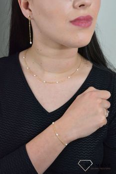 Bransoletka damska perła majorka DIA-BRA-4887-925. Delikatna, pozłacana bransoletka składająca się z drobnych kamieni naturalnych. Bransoletka z perełkami (3).JPG