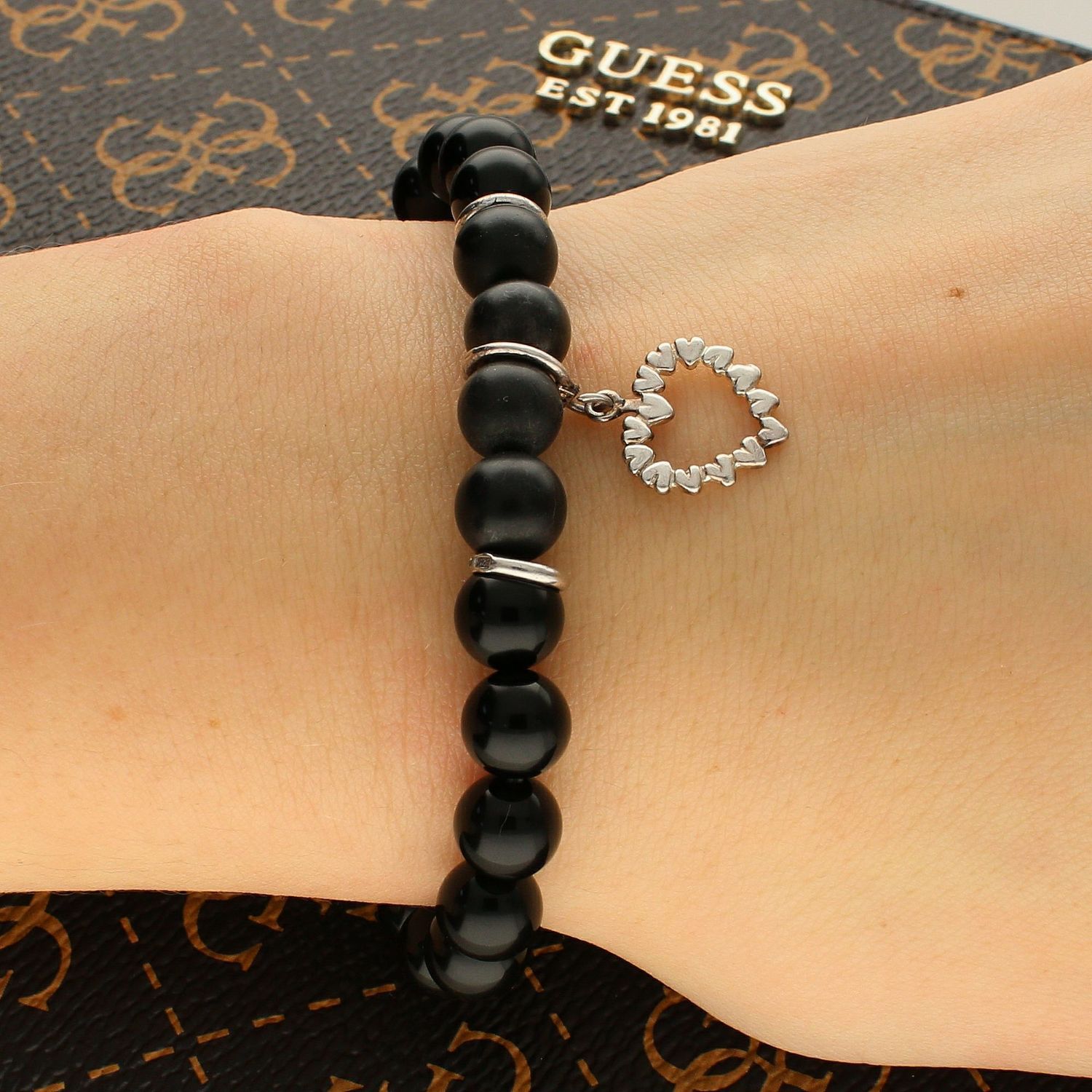 Bransoletka damska Onyksy z zawieszką serca DIA-BRA-5661-925 Bransoletka na gumce. Bransoletka z Onyksem. Bransoletka z kamieniem naturalnym. Bransoletka z zawieszką, z sercem  (1).jpg