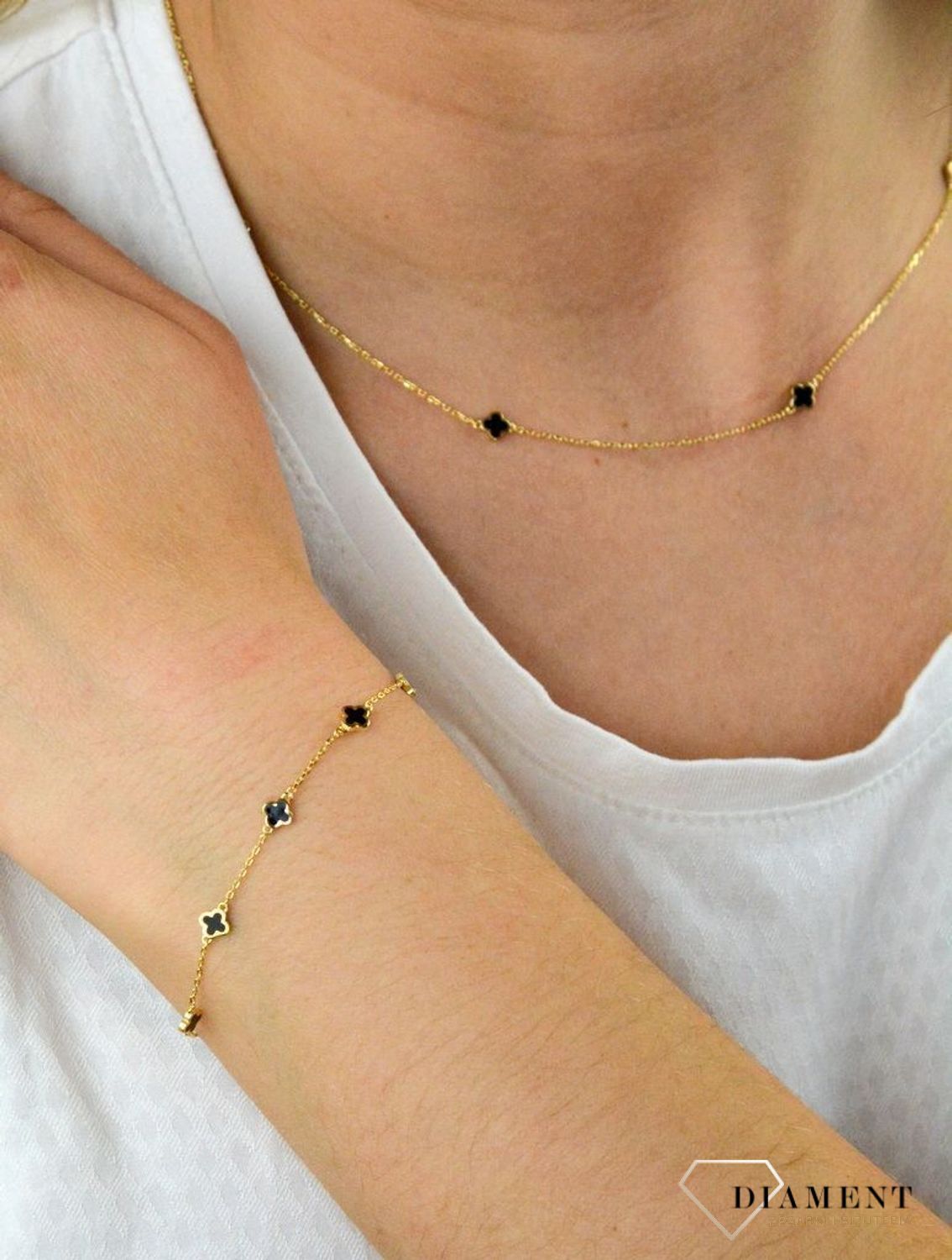 Bransoletka pozłacana  Czarne koniczynki  925 DIA-BRA-5953-925 Pozłacana bransoletka wykonana z najwyższej próby srebra z subtelnymi koniczynkami. Idealny pomysł na prezent (1).jpg